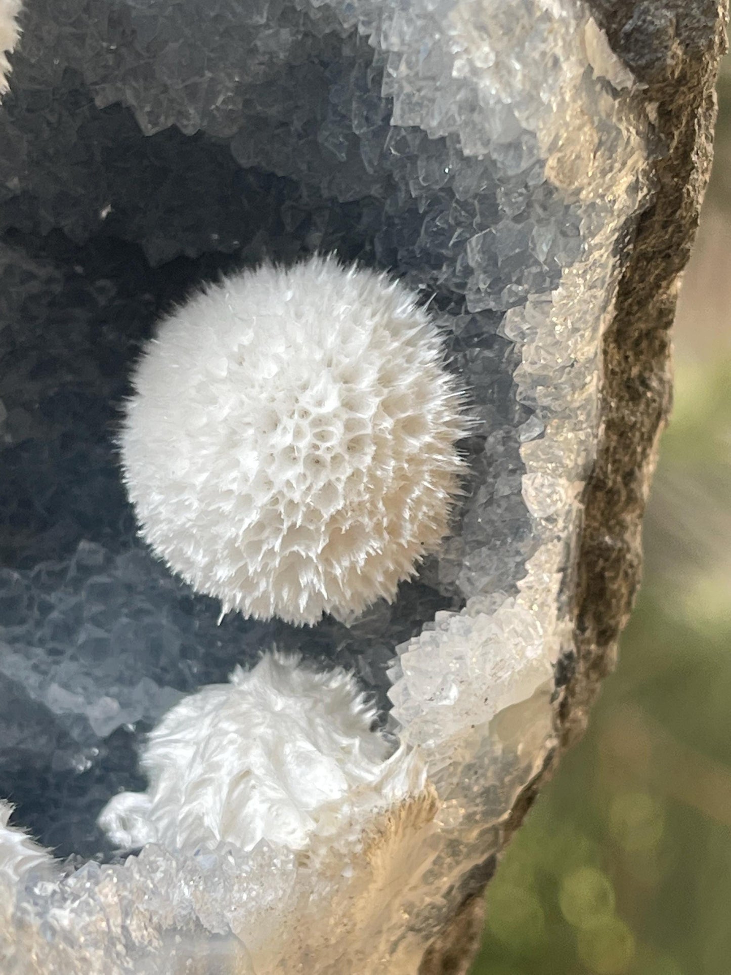 Multiple okenite ball on blue chalcedony quartz