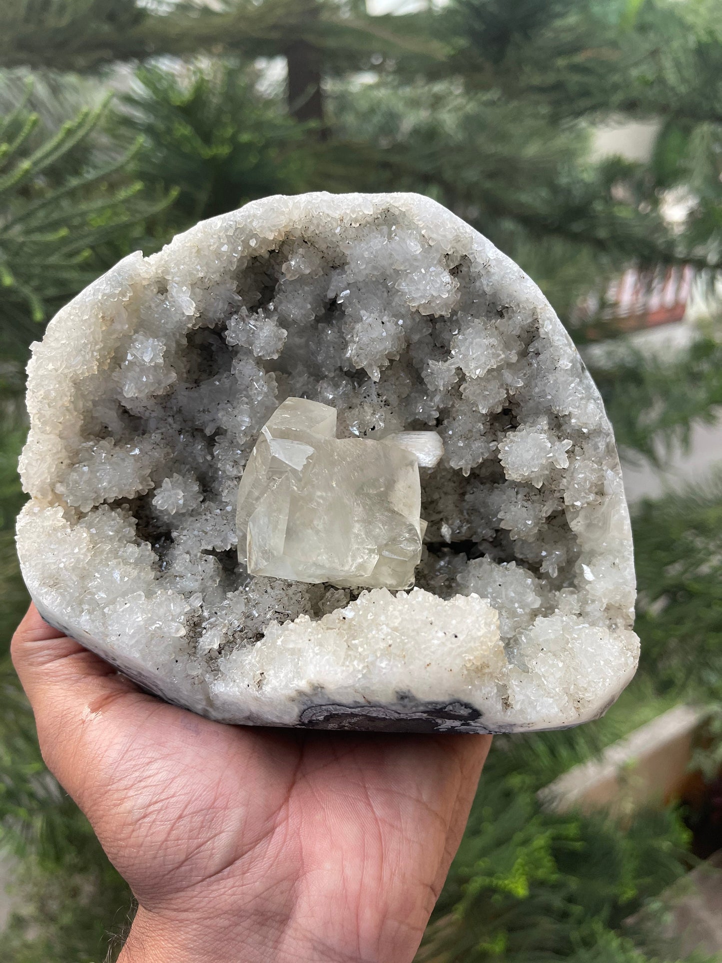 Natural calcite cube on chalcedony coral