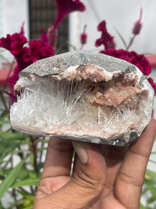 Scolecite spray with stilbite crystal inside orange heulandite geode